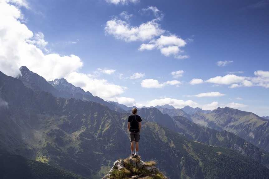 image showing a person isolated on a mountain top
